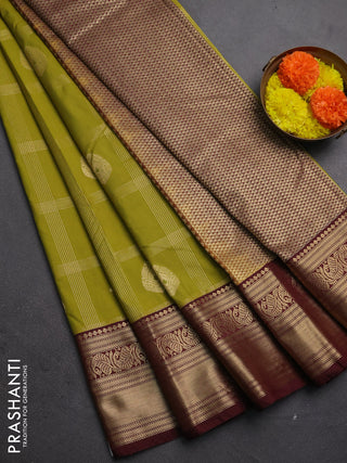 Semi kanchipuram silk saree mehendi green and maroon shade with allover zari checks & buttas and zari woven border
