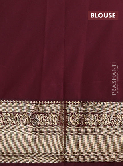 Semi kanchipuram silk saree mehendi green and maroon shade with allover zari checks & buttas and zari woven border