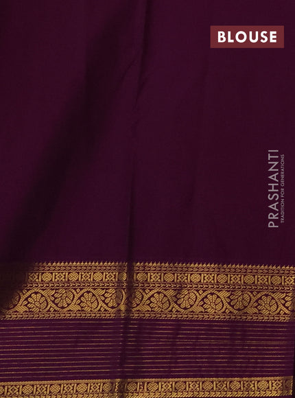 Semi kanchipuram silk saree teal blue and purple with zari woven buttas and zari woven korvai border