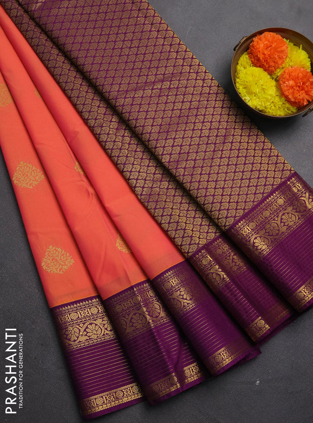 Semi kanchipuram silk saree peach orange and purple with zari woven buttas and zari woven korvai border
