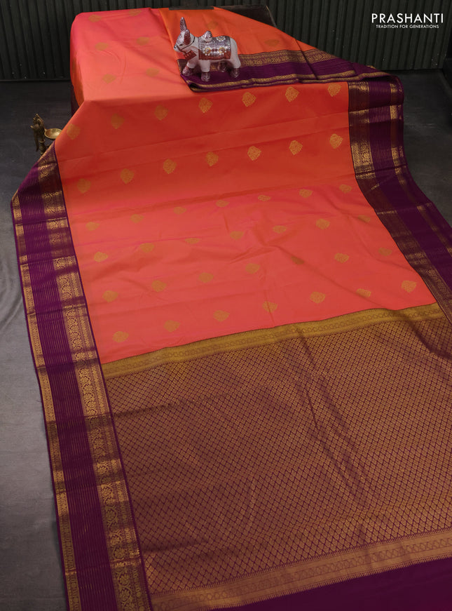 Semi kanchipuram silk saree peach orange and purple with zari woven buttas and zari woven korvai border
