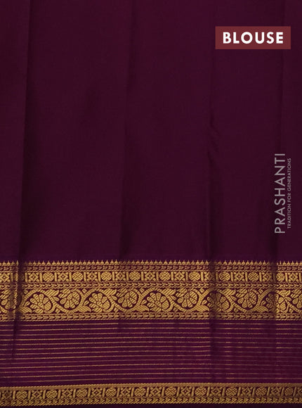 Semi kanchipuram silk saree teal green and purple with zari woven buttas and zari woven korvai border