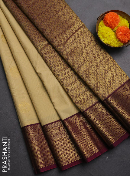 Semi kanchipuram silk saree beige and dark magenta pink with allover zari weaves & buttas and zari woven korvai border