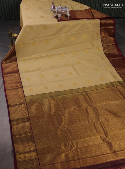 Semi kanchipuram silk saree beige and dark magenta pink with allover zari weaves & buttas and zari woven korvai border