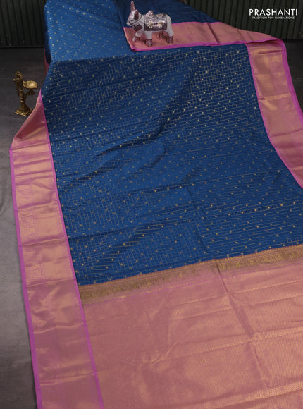 Semi kanchipuram silk saree peacock blue and lotus pink with allover zari checks & buttas and rich zari woven korvai border