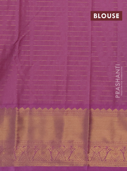 Semi kanchipuram silk saree peacock blue and lotus pink with allover zari checks & buttas and rich zari woven korvai border