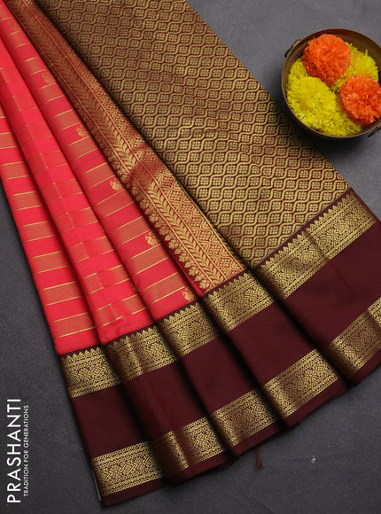Semi kanchipuram silk saree dual shade of pinkish orange and deep maroon with allover zari weaves & buttas and rettapet zari woven border