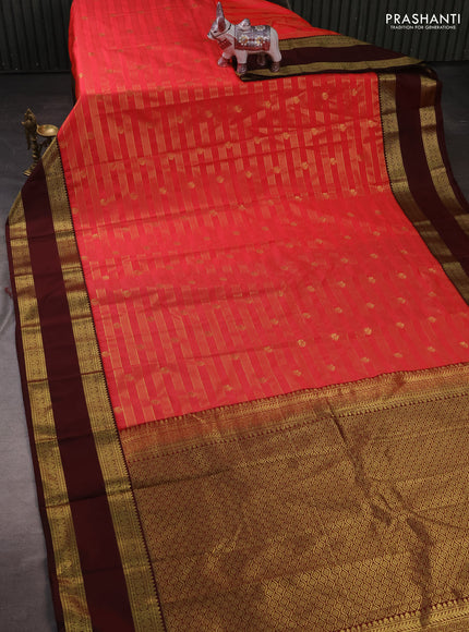Semi kanchipuram silk saree dual shade of pinkish orange and deep maroon with allover zari weaves & buttas and rettapet zari woven border