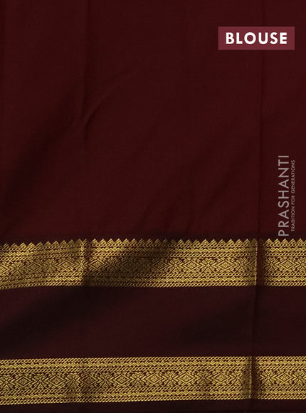 Semi kanchipuram silk saree dual shade of pinkish orange and deep maroon with allover zari weaves & buttas and rettapet zari woven border