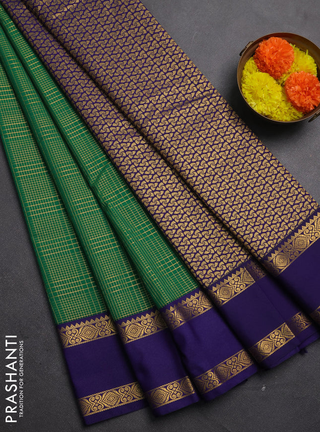 Semi kanchipuram silk saree green and navy blue with allover small zari checked pattern and rettapet zari woven border