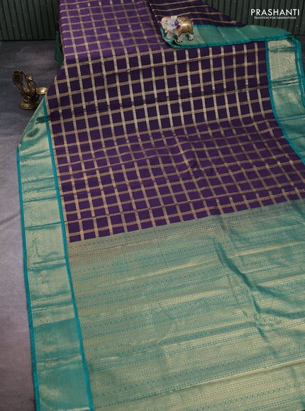 Semi kanchipuram silk saree deep purple and teal green with allover zari checked pattern and zari woven korvai border