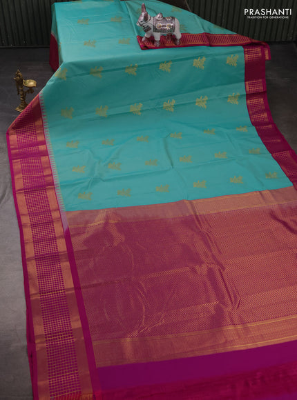 Semi kanchipuram silk saree teal blue and pink with zari woven buttas and zari woven border