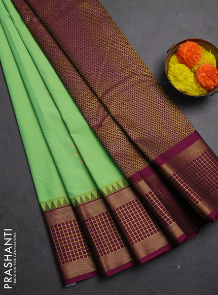 Semi kanchipuram silk saree pista green and magenta pink with zari woven buttas and zari woven border