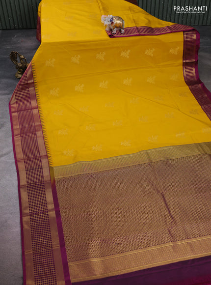Semi kanchipuram silk saree mustard yellow and magenta pink with zari woven buttas and zari woven border