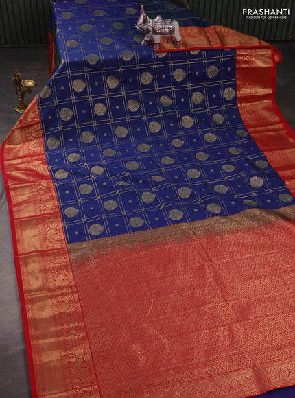 Semi kanchipuram silk saree dual shade of bluish green and tomato pink with allover zari checks & buttas and zari woven korvai border