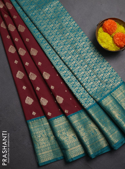 Semi kanchipuram silk saree maroon and teal green with allover zari woven buttas and zari woven korvai border