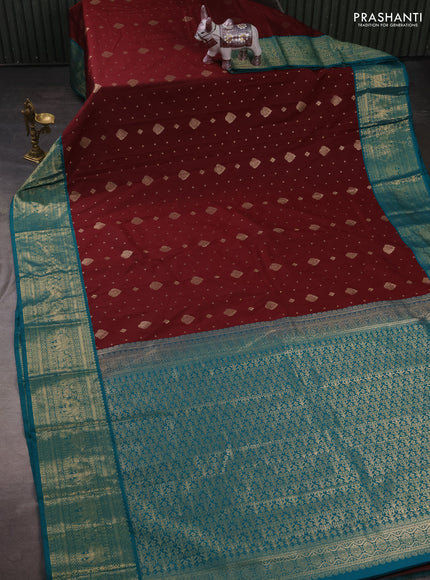 Semi kanchipuram silk saree maroon and teal green with allover zari woven buttas and zari woven korvai border