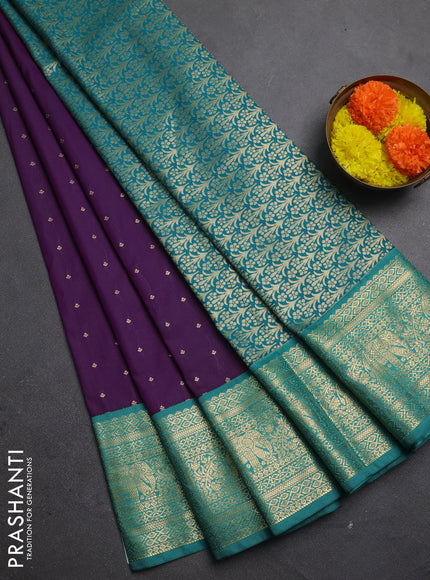 Semi kanchipuram silk saree purple and teal green with allover zari woven buttas and zari woven korvai border