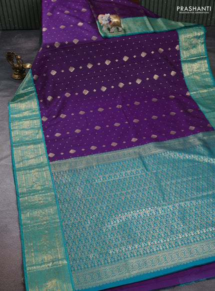 Semi kanchipuram silk saree purple and teal green with allover zari woven buttas and zari woven korvai border