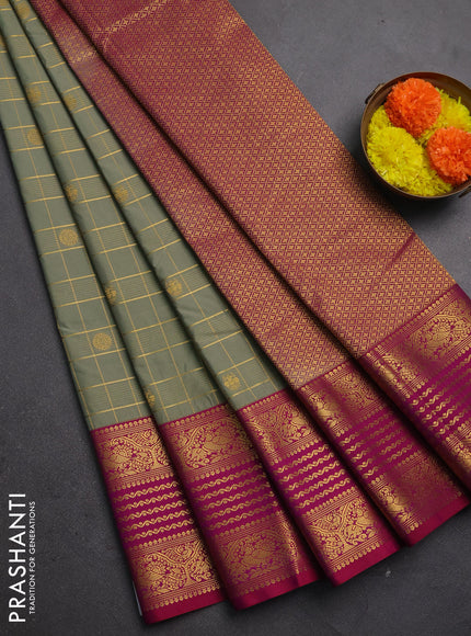 Semi kanchipuram silk saree pastel green and pink with allover zari checks & buttas and long zari woven korvai border