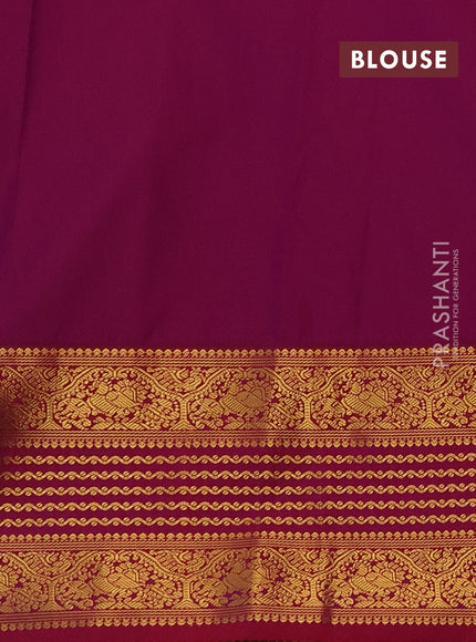 Semi kanchipuram silk saree pastel green and pink with allover zari checks & buttas and long zari woven korvai border