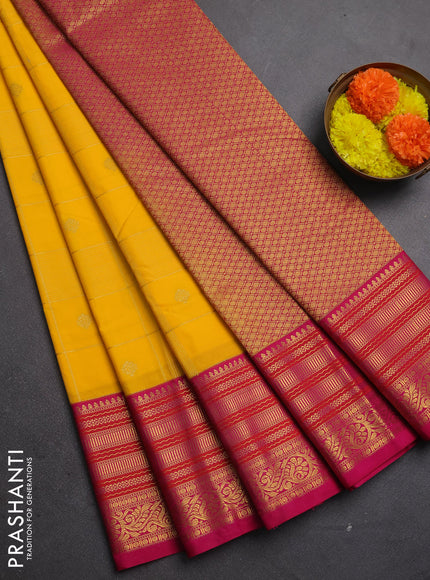 Semi kanchipuram silk saree yellow and pink with allover zari checks & buttas and long zari woven korvai border