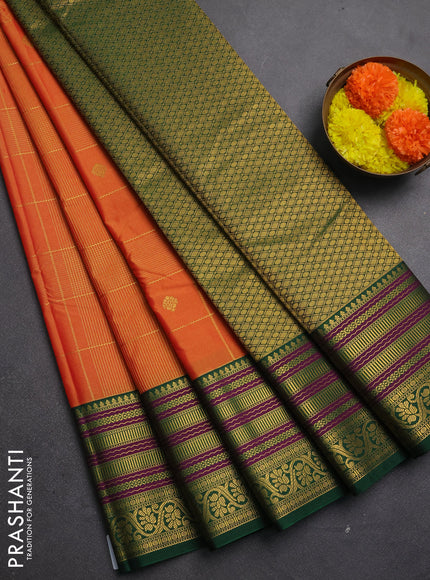 Semi kanchipuram silk saree sunset orange and green with allover zari checks & buttas and long zari woven korvai border