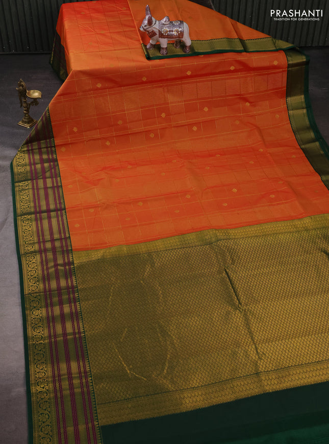 Semi kanchipuram silk saree sunset orange and green with allover zari checks & buttas and long zari woven korvai border