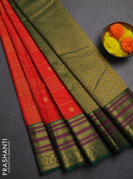 Semi kanchipuram silk saree orange and green with allover zari checks & buttas and zari woven korvai border