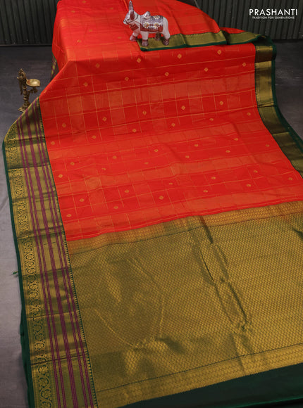 Semi kanchipuram silk saree orange and green with allover zari checks & buttas and zari woven korvai border