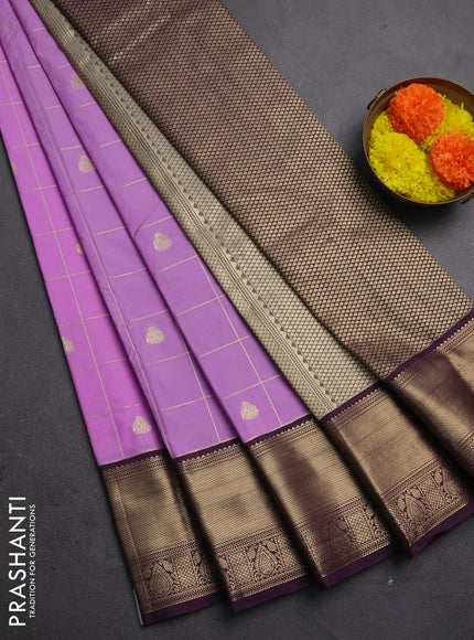 Semi kanchipuram silk saree lavender and deep purple with allover zari checks & buttas and zari woven korvai border