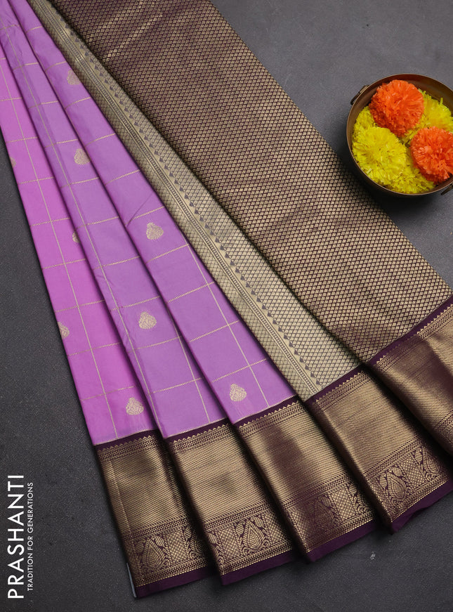 Semi kanchipuram silk saree lavender and deep purple with allover zari checks & buttas and zari woven korvai border