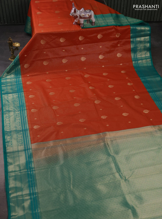 Semi kanchipuram silk saree rust shade and teal green with allover zari weaves & buttas and zari woven korvai border