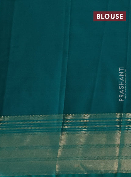 Semi kanchipuram silk saree rust shade and teal green with allover zari weaves & buttas and zari woven korvai border