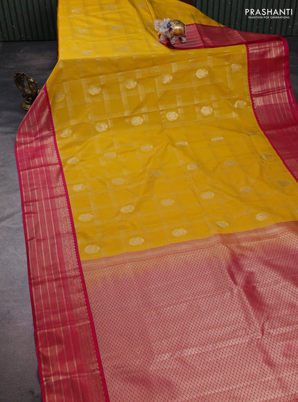 Semi kanchipuram silk saree yellow and pink with allover zari checks & buttas and zari woven korvai border