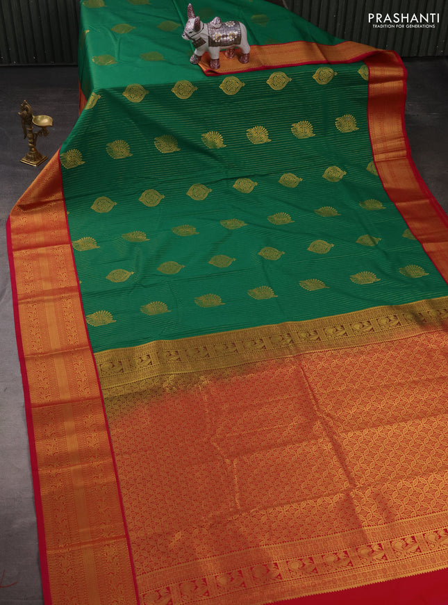 Semi kanchipuram silk saree green and pink with allover zari stripes & buttas and zari woven korvai border