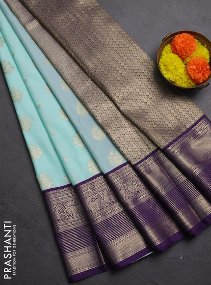 Semi kanchipuram silk saree mild teal blue and purple with allover zari woven buttas and long zari woven korvai border