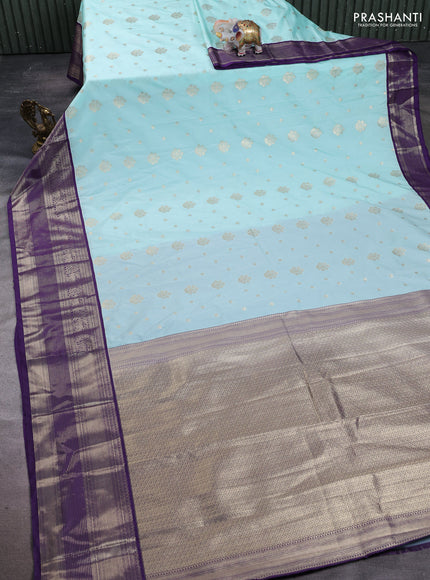 Semi kanchipuram silk saree mild teal blue and purple with allover zari woven buttas and long zari woven korvai border