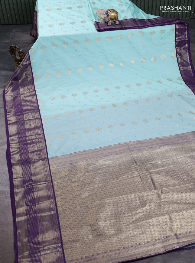 Semi kanchipuram silk saree mild teal blue and purple with allover zari woven buttas and long zari woven korvai border