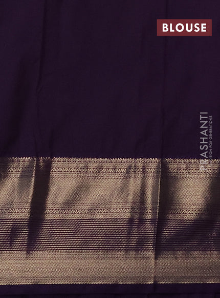 Semi kanchipuram silk saree mild teal green and purple with allover zari woven buttas and long zari woven korvai border