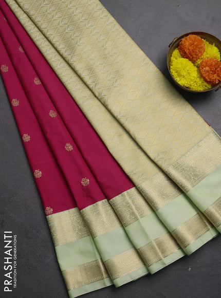Semi kanchipuram silk saree pink and mild pista green with zari woven buttas and rettapet zari woven korvai border