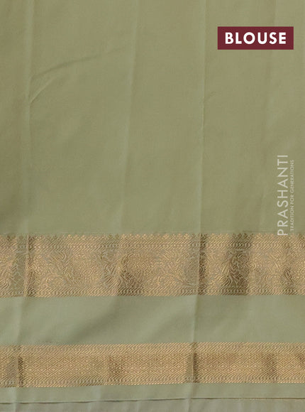 Semi kanchipuram silk saree pink and mild pista green with zari woven buttas and rettapet zari woven korvai border