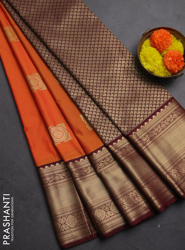 Semi kanchipuram silk saree orange and maroon with zari woven buttas and long zari woven korvai border