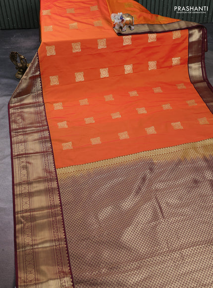 Semi kanchipuram silk saree orange and maroon with zari woven buttas and long zari woven korvai border