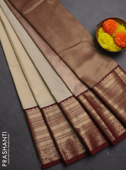 Semi kanchipuram silk saree beige and maroon with zari woven buttas and long zari woven korvai border