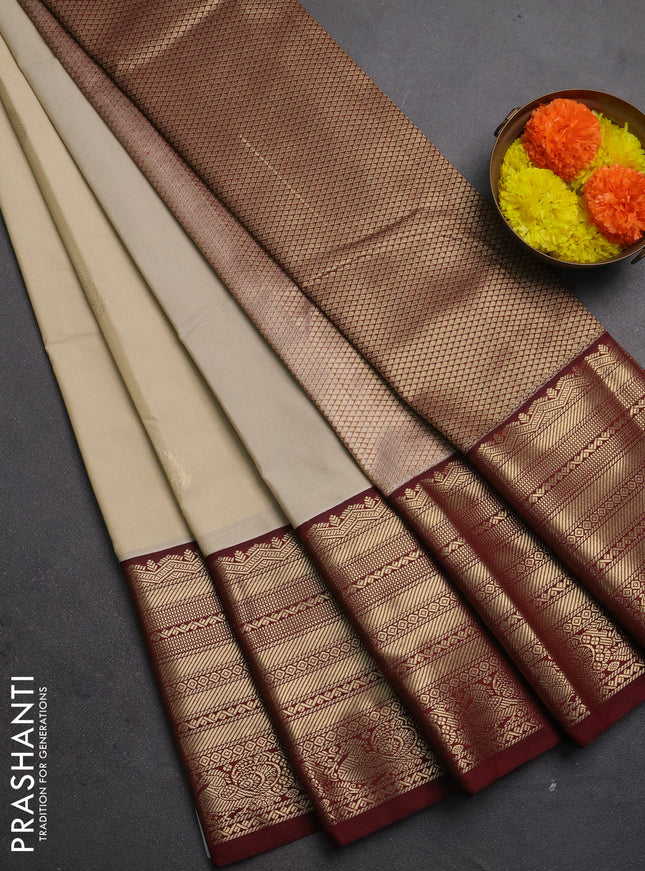 Semi kanchipuram silk saree beige and maroon with zari woven buttas and long zari woven korvai border