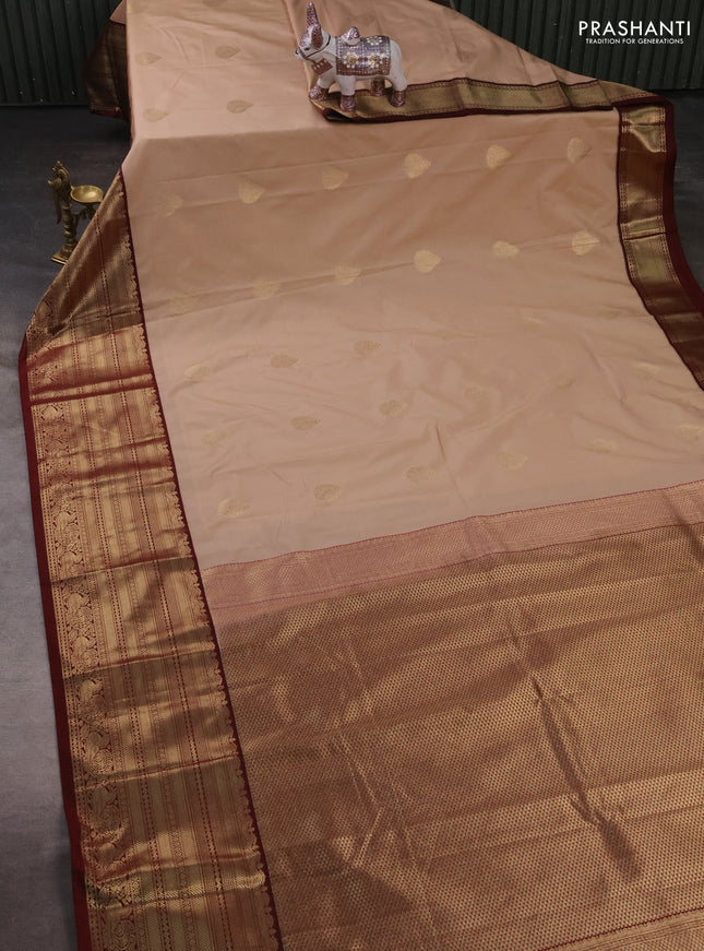 Semi kanchipuram silk saree beige and maroon with zari woven buttas and long zari woven korvai border