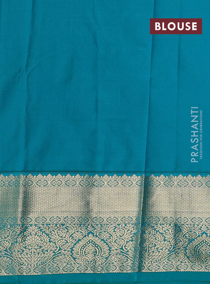 Semi kanchipuram silk saree black and teal green with allover zari checks & buttas and zari woven korvai border
