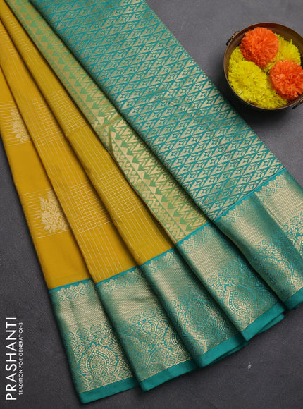 Semi kanchipuram silk saree mustard yellow and teal green with allover zari checks & buttas and zari woven korvai border