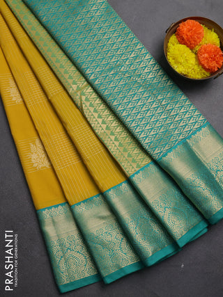 Semi kanchipuram silk saree mustard yellow and teal green with allover zari checks & buttas and zari woven korvai border